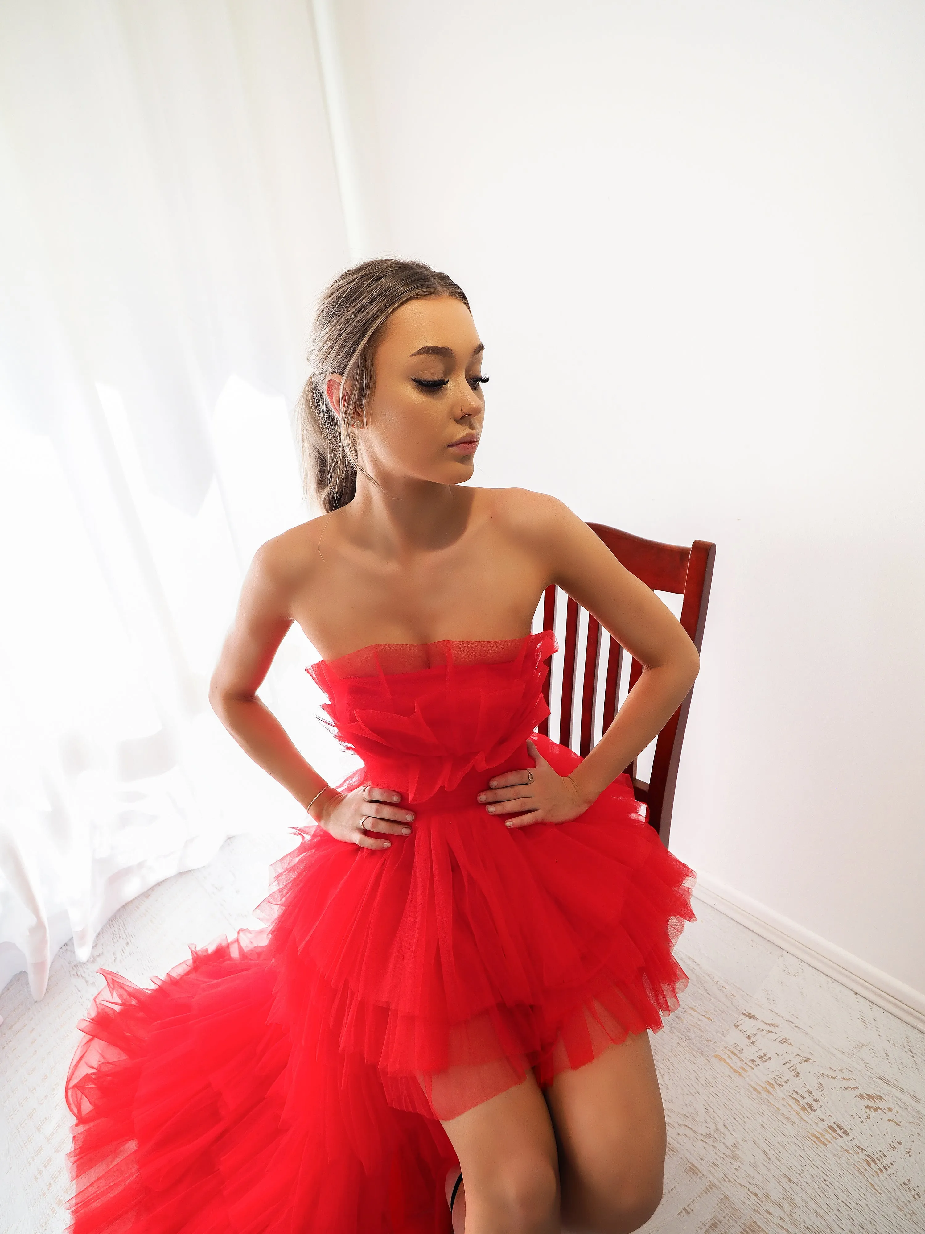 Red pleated layered high and low tulle dress for hire