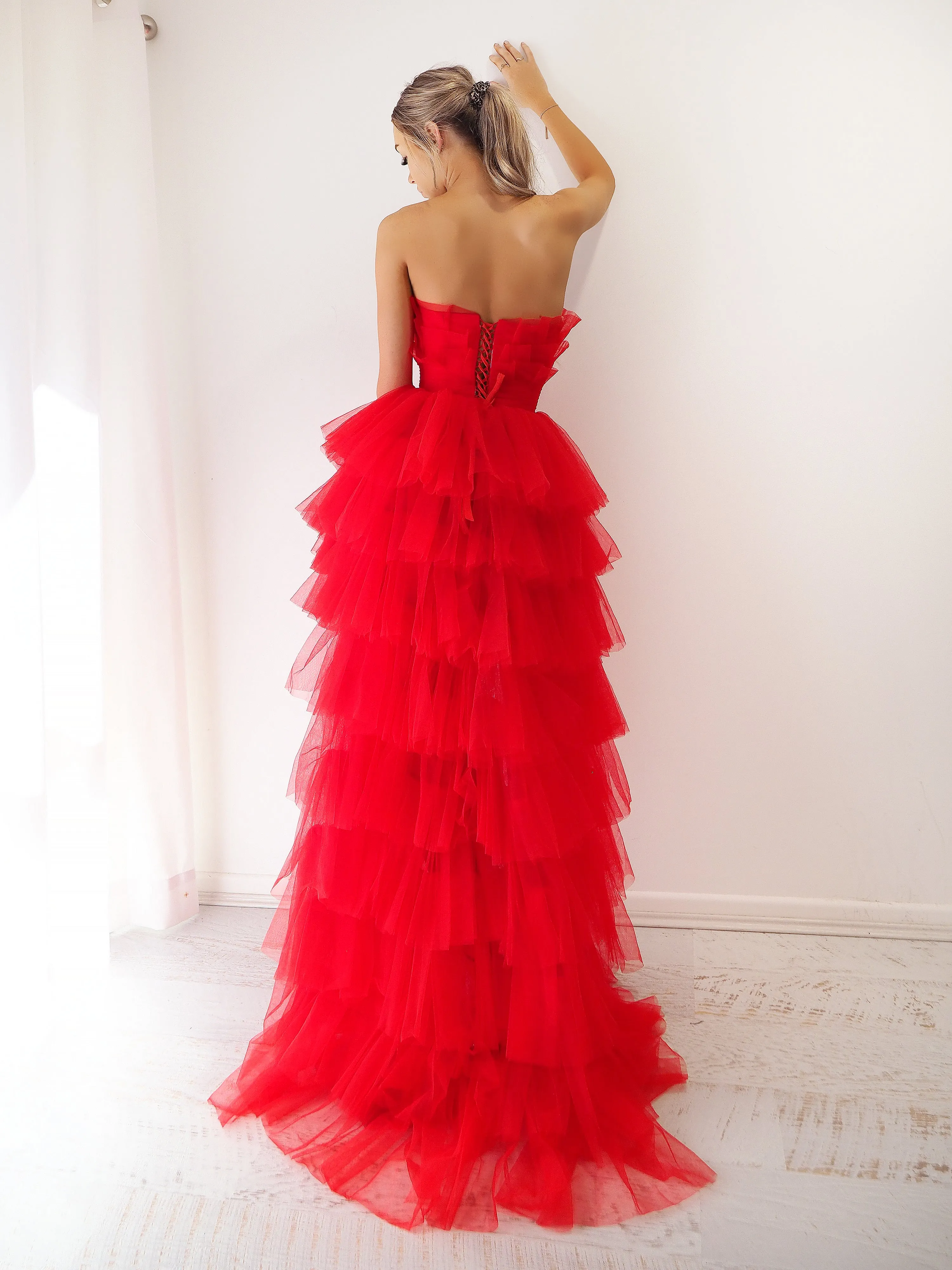 Red pleated layered high and low tulle dress for hire