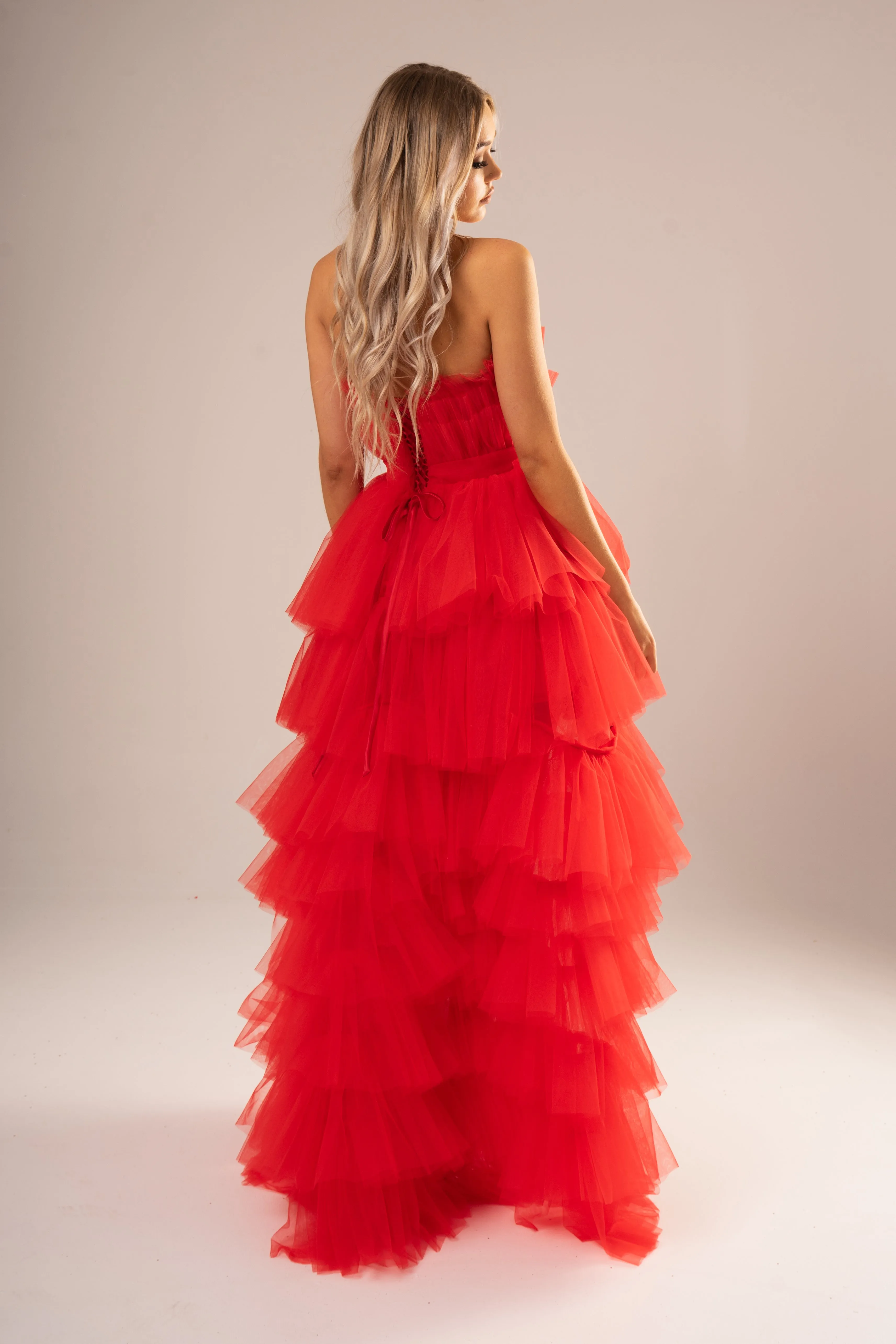 Red pleated layered high and low tulle dress for hire